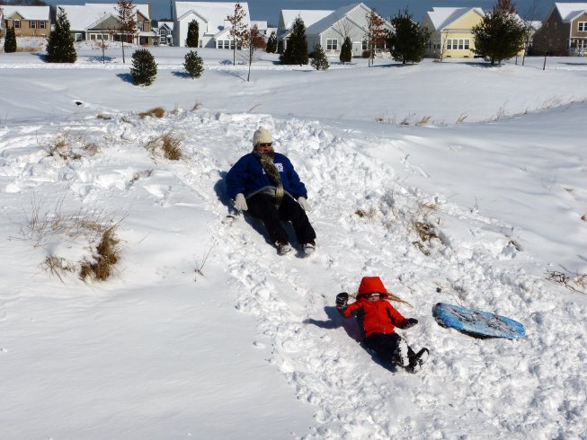 Sliding down Grammy's hill